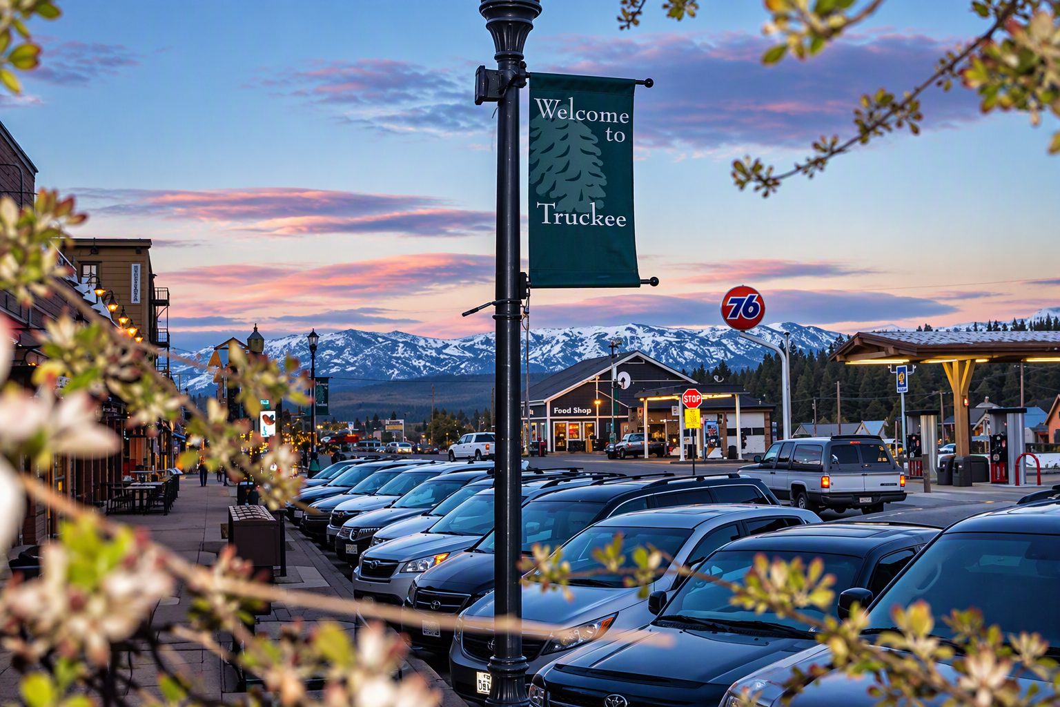 Downtown Truckee California with mountain views, local shops, and the Welcome to Truckee sign in the North Lake Tahoe region.